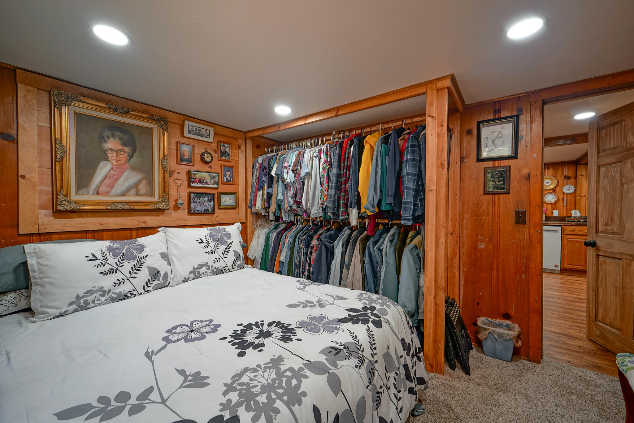 420 Price Creek Road Big Bar, CA 96010 - Photo 29 of 63 a bedroom with a large bed and a large mirror