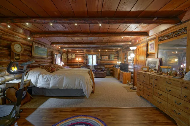 a view of street from deck with patio