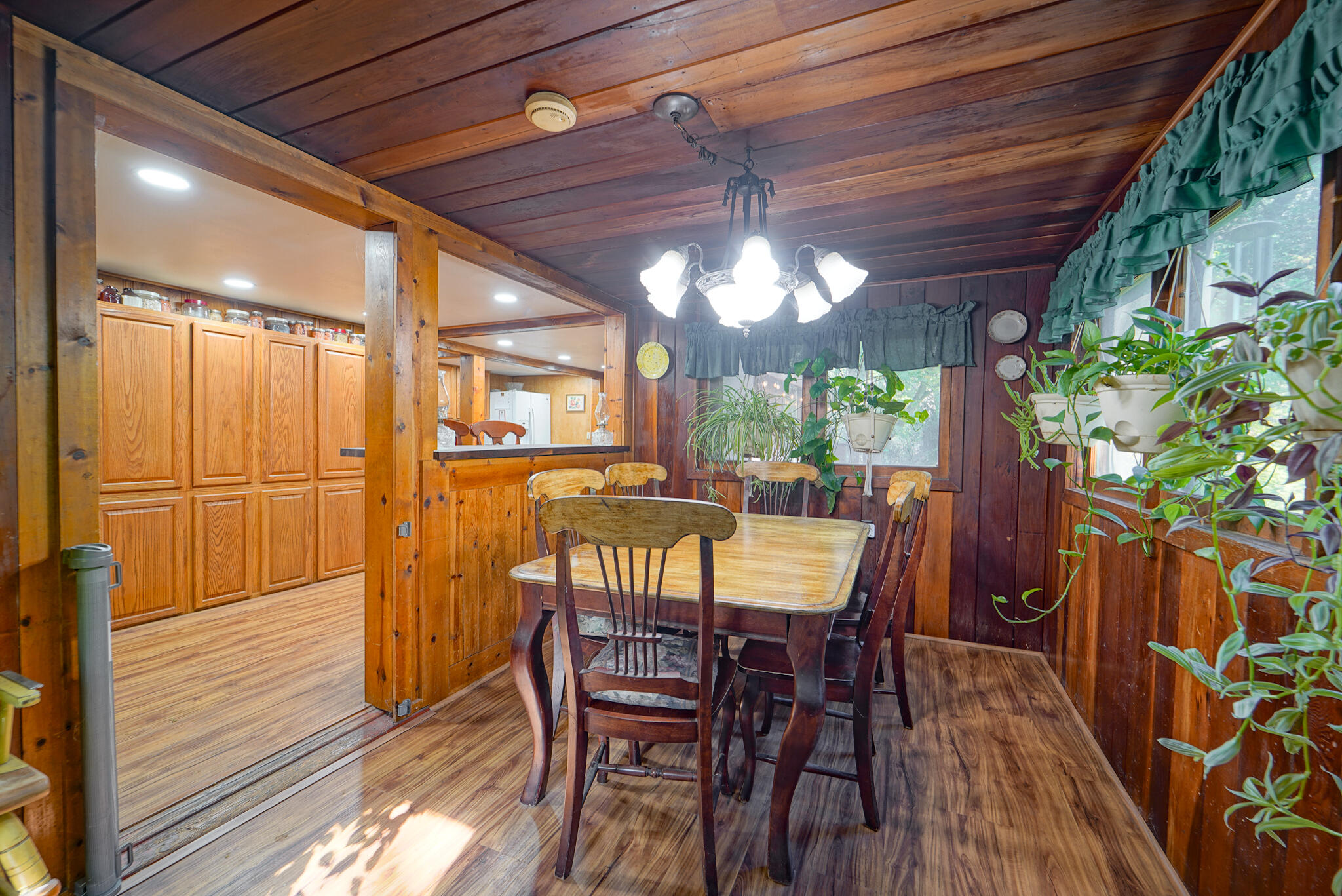 420 Price Creek Road Big Bar, CA 96010 - Photo 40 of 63 a view of a dining room with furniture window and wooden floor