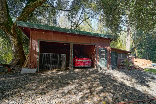 a view of a backyard of the house