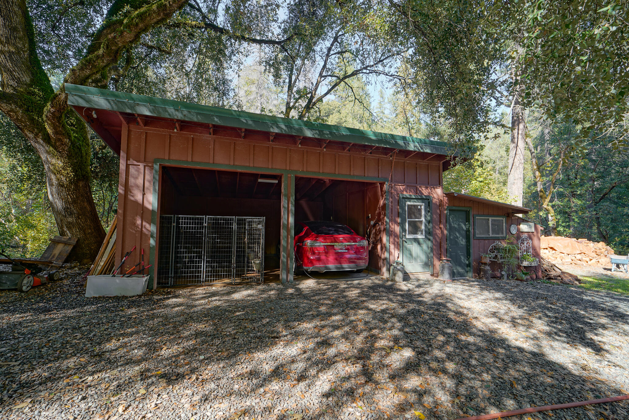 420 Price Creek Road Big Bar, CA 96010 - Photo 8 of 63 a view of a house with a small yard and large tree