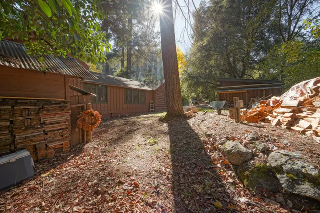 a view of backyard with green space