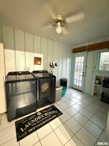 a kitchen with sink cabinets and window