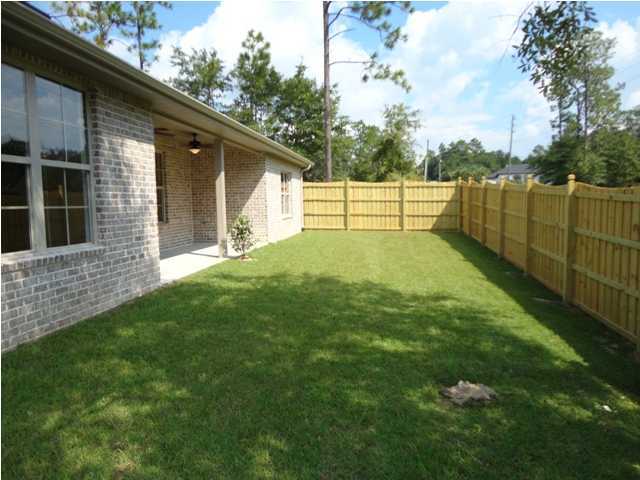 4644 Hermosa Road Crestview, FL 32539 - Photo 3 of 30 a view of backyard with green space