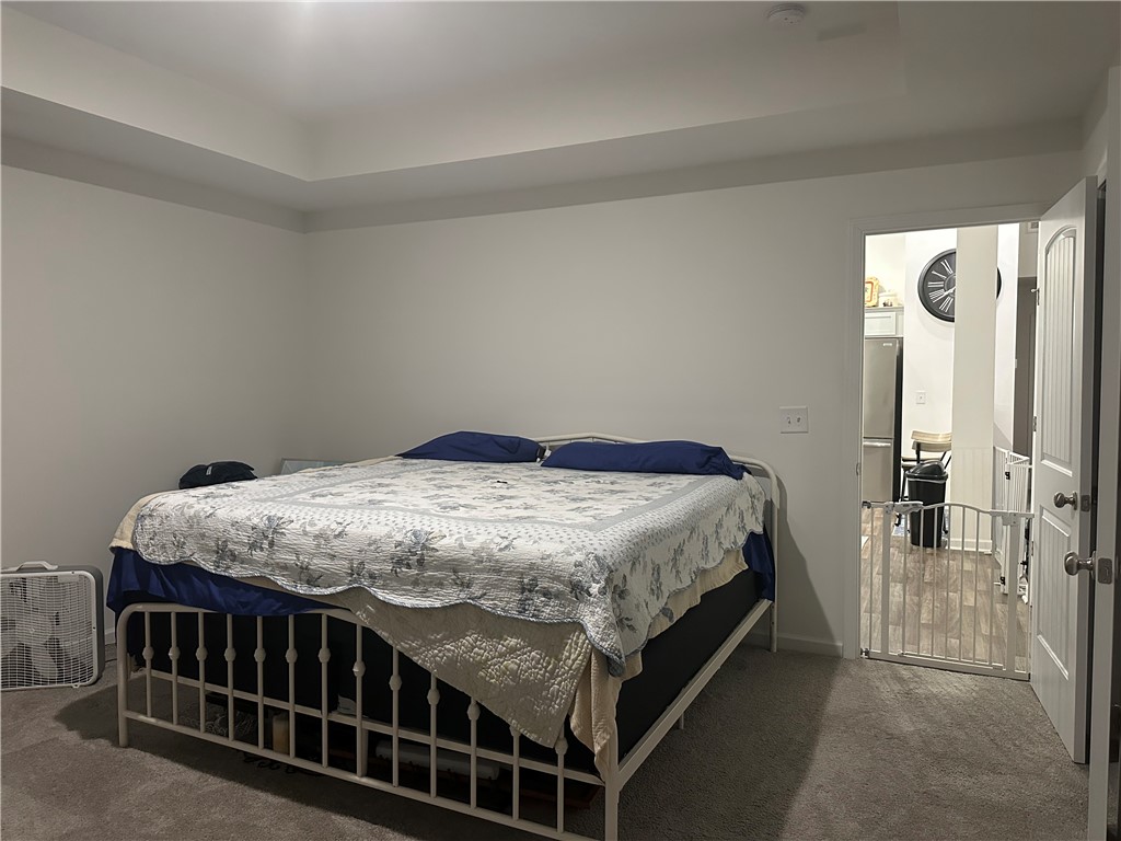 505 Blue Ridge Avenue Belton, SC 29627 - Photo 4 of 17 This inviting bedroom features a cozy sleeping area and soft carpeting for ultimate comfort.