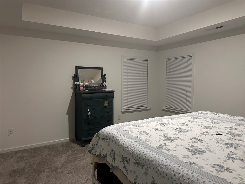 505 Blue Ridge Avenue Belton, SC 29627 - Photo 5 of 17 This tranquil bedroom offers comfort and a relaxed atmosphere.