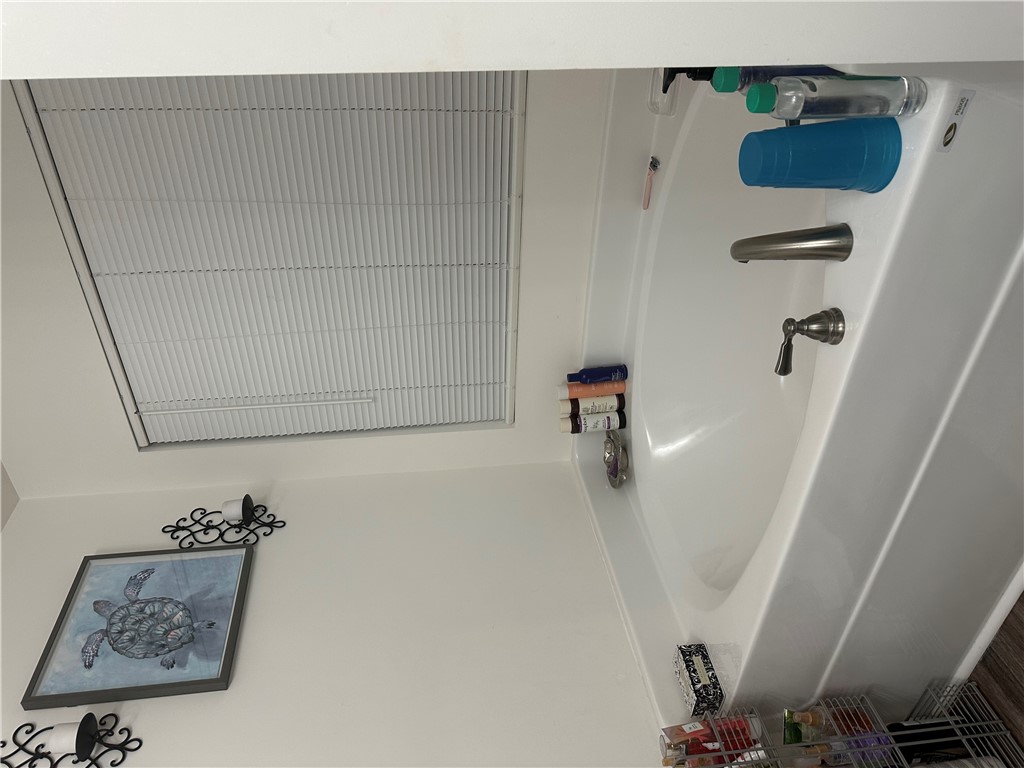 505 Blue Ridge Avenue Belton, SC 29627 - Photo 6 of 17 Relax and unwind in this inviting bathroom featuring a deep soaking tub.