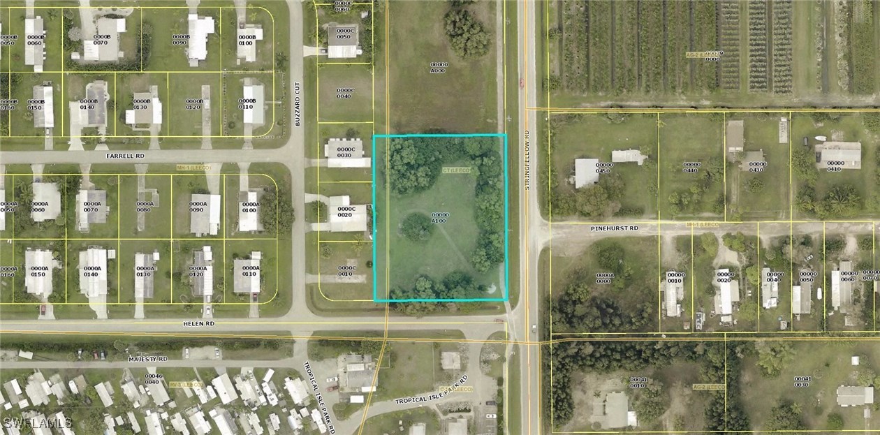 15221 Stringfellow Road Bokeelia, FL 33922 - Photo 2 of 3 a bathroom with glass door