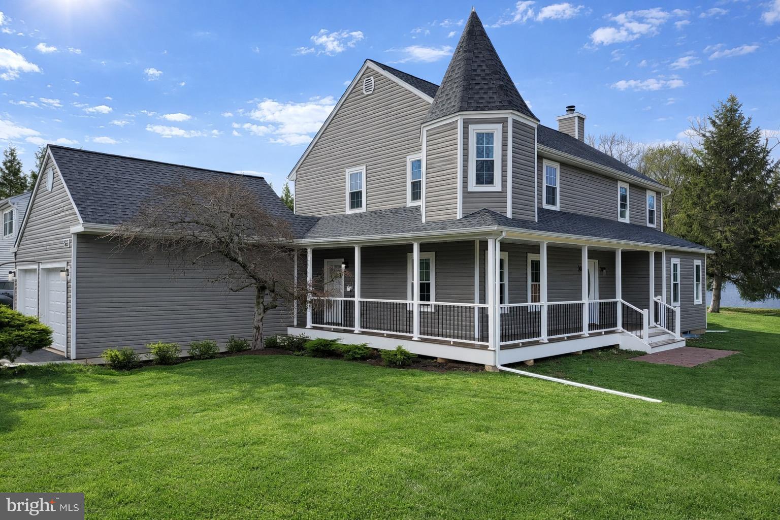 Charming home with a picturesque porch.