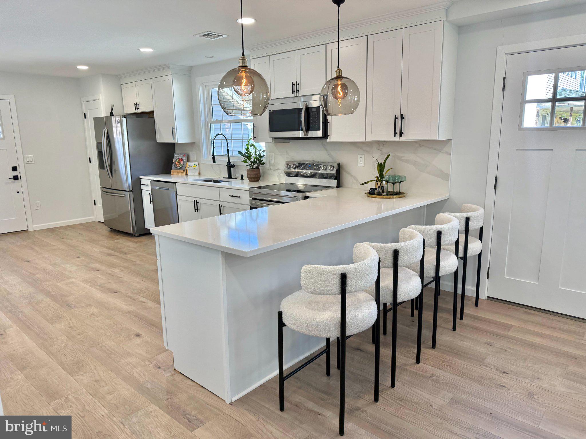 565 Hulmeville Road Langhorne, PA 19047 - Photo 11 of 32 Modern kitchen with sleek design.