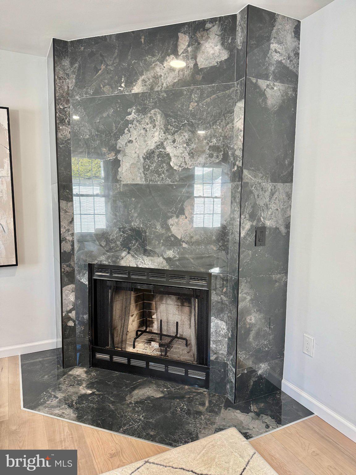 565 Hulmeville Road Langhorne, PA 19047 - Photo 13 of 32 Sleek marble fireplace centerpiece.
