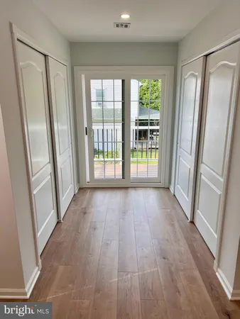 a view of empty room with front door