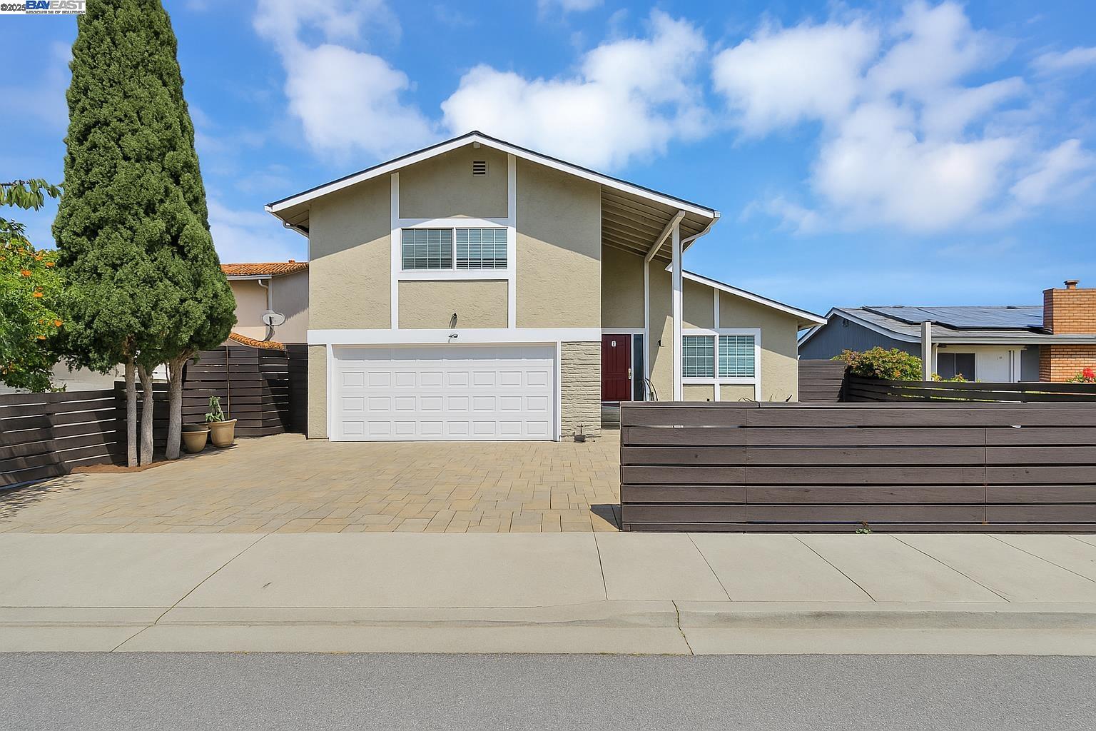 597 Singley Drive Milpitas, CA 95035 - Photo 1 of 1 a front view of a house with a yard