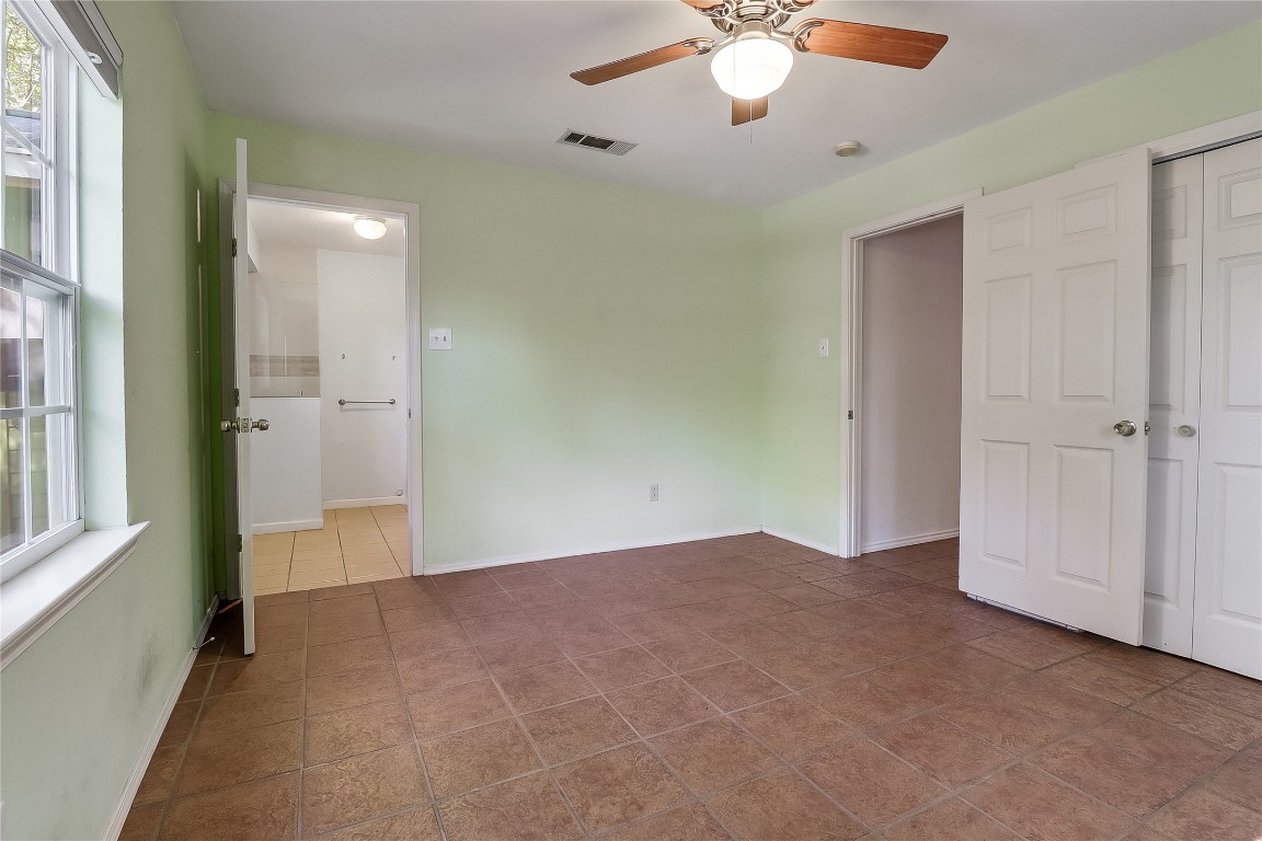 1706 Maple Avenue Austin, TX 78702 - Photo 16 of 30 an empty room with fan and entrance