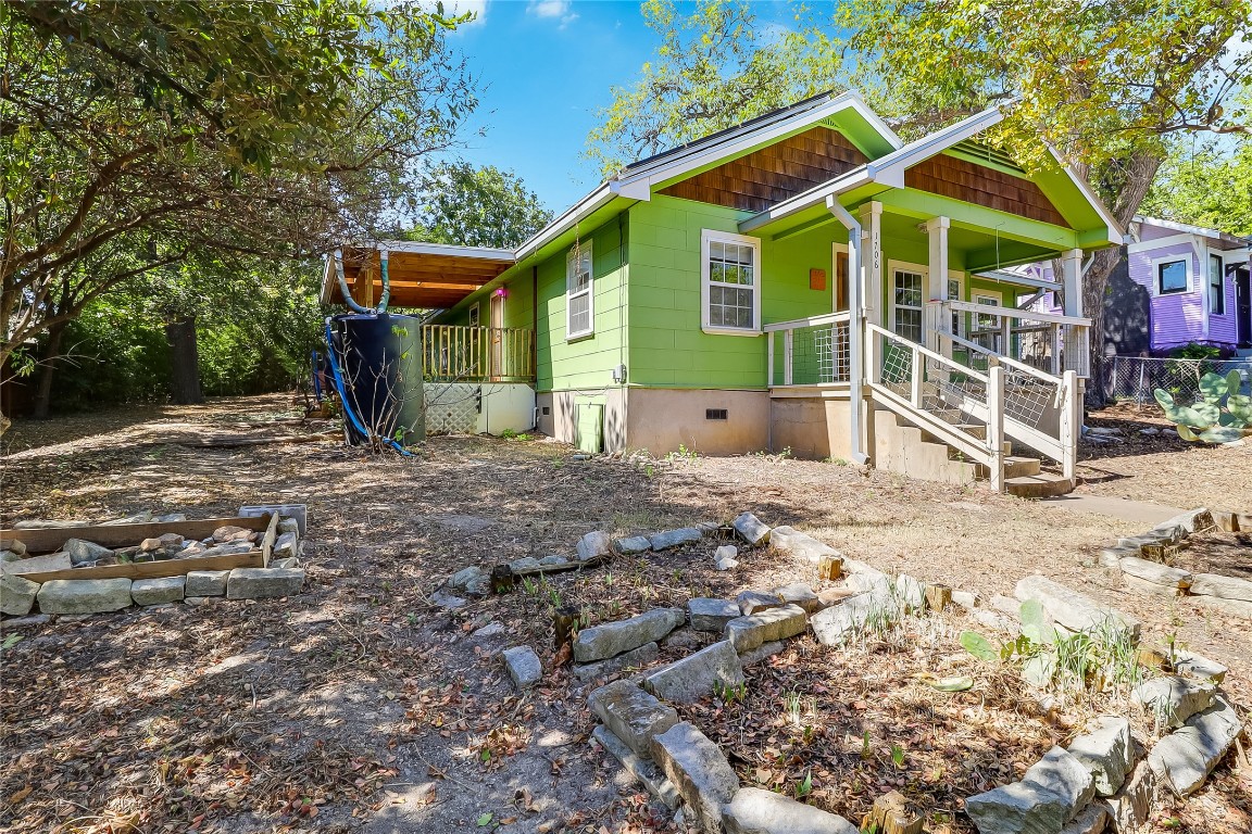 1706 Maple Avenue Austin, TX 78702 - Photo 2 of 30 a view of a house with a yard and wooden fence