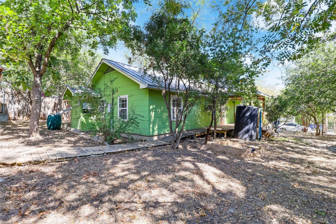 1706 Maple Avenue Austin, TX 78702 - Photo 21 of 30 a view of a house with backyard porch and sitting area
