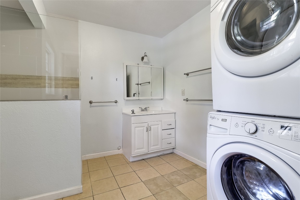 1706 Maple Avenue Austin, TX 78702 - Photo 10 of 30 a view of a storage and utility room with washer and dryer
