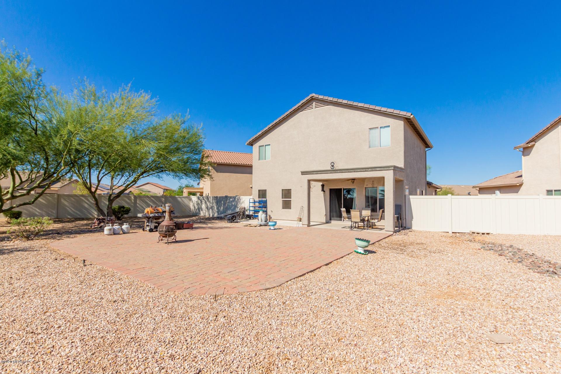 21203 East Reunion Road Red Rock, AZ 85145 - Photo 24 of 26 a view of a house with outdoor space and sitting area