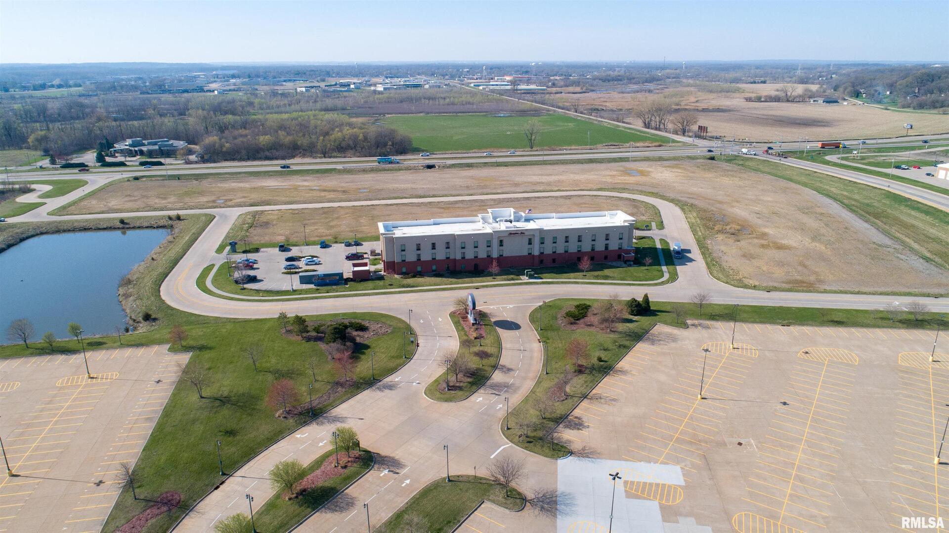 2951 Wild Rose Drive Clinton, IA 52732 - Photo 14 of 15 an aerial view of a swimming pool and outdoor space