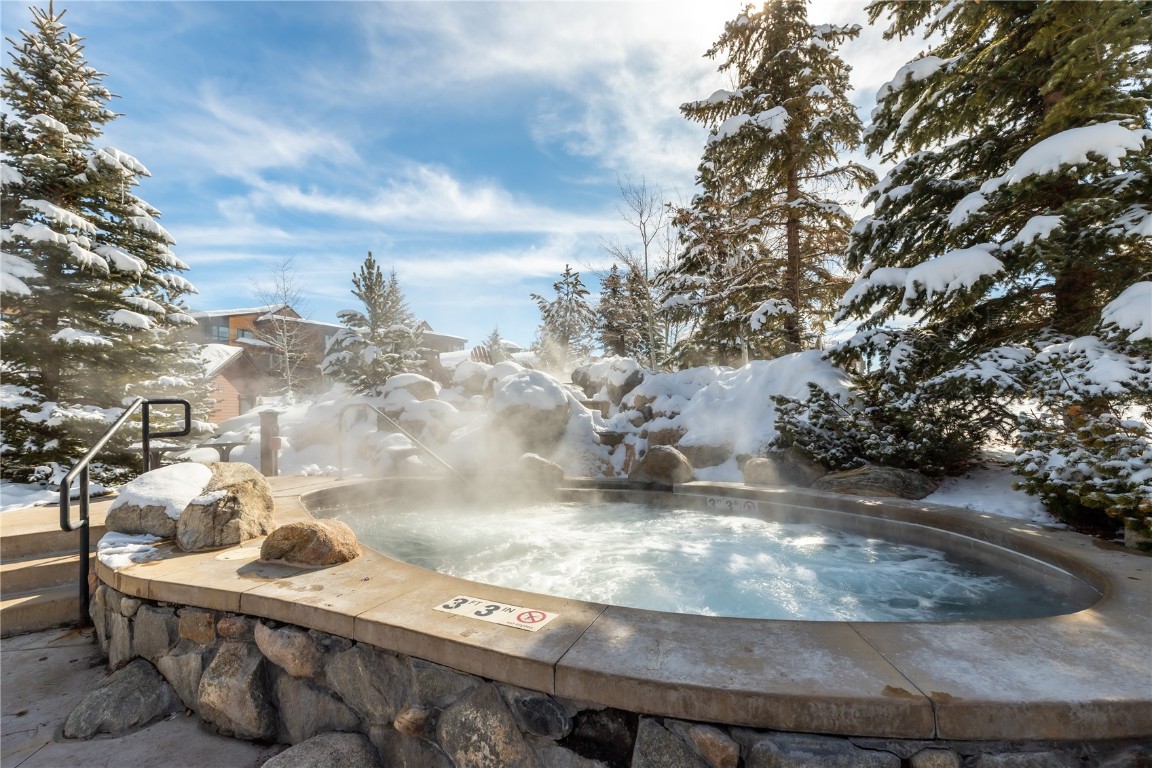 1175 Bangtail Way, Unit 2106 Steamboat Springs, CO 80487 - Photo 32 of 32 a view of a wooden floor with a view of sitting area