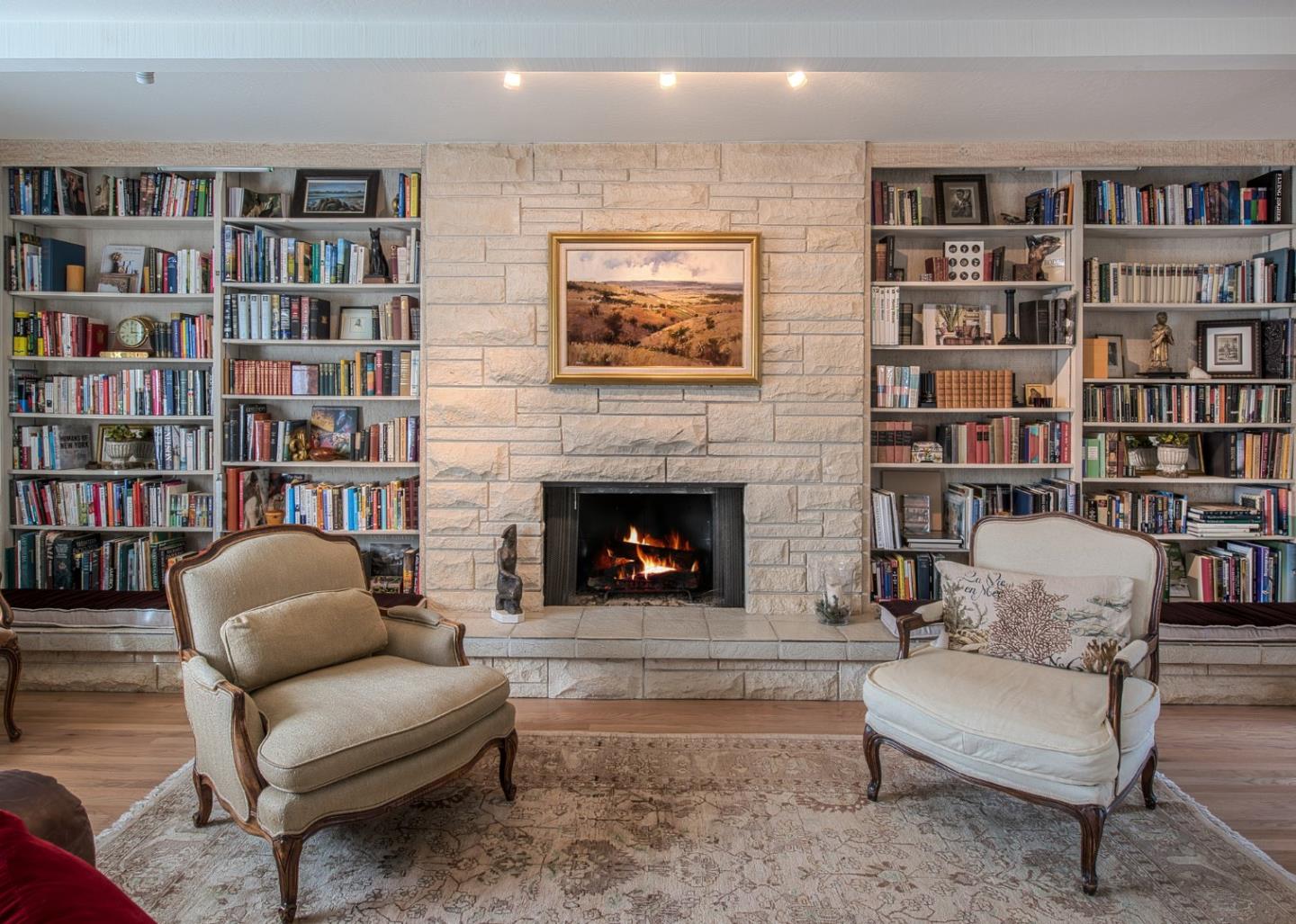 3048 Larkin Road Pebble Beach, CA 93953 - Photo 13 of 24 a living room with furniture and a fireplace