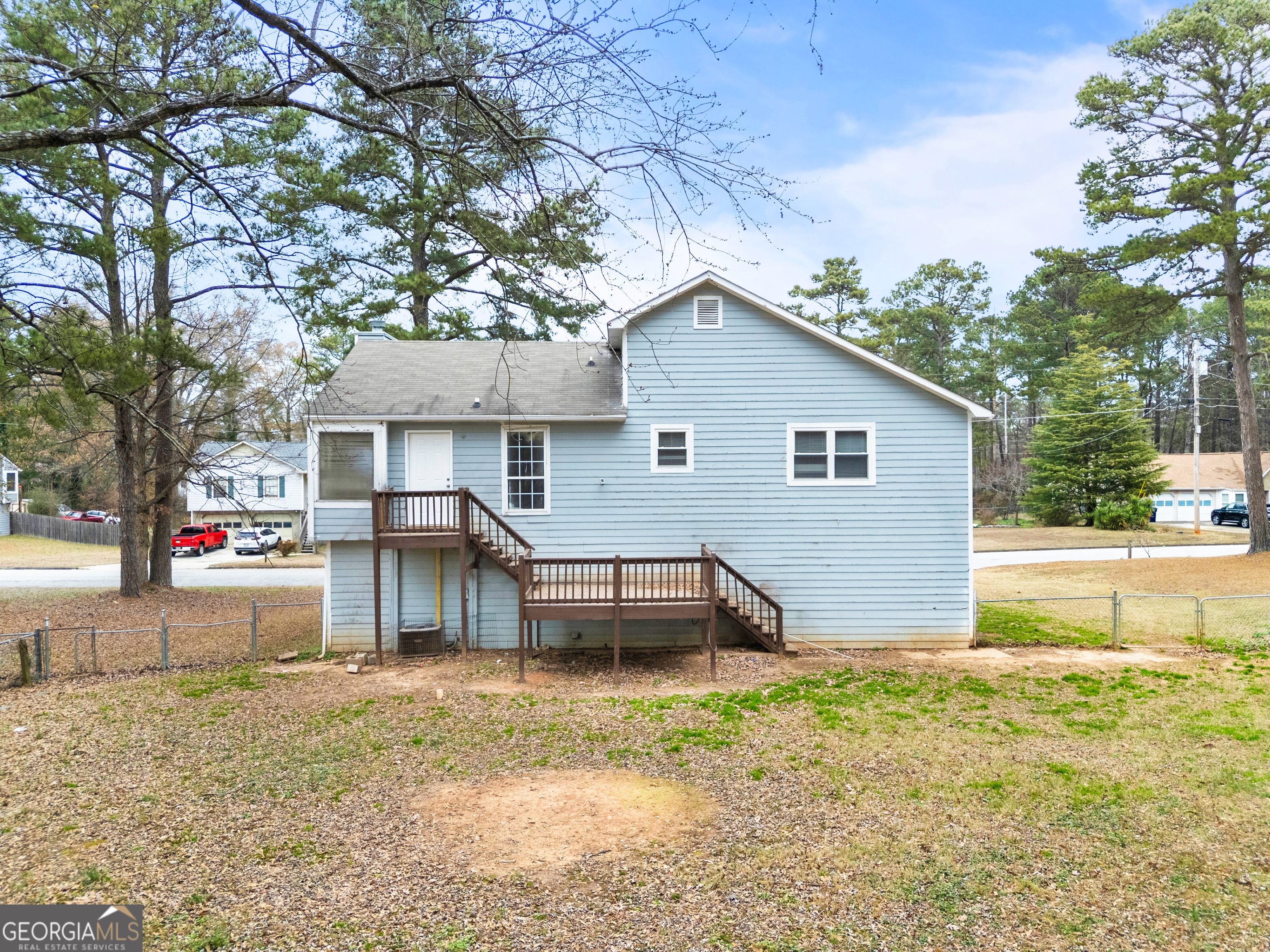6155 Pointer Way Douglasville, GA 30135 - Photo 25 of 26 a view of a house with a yard and sitting area