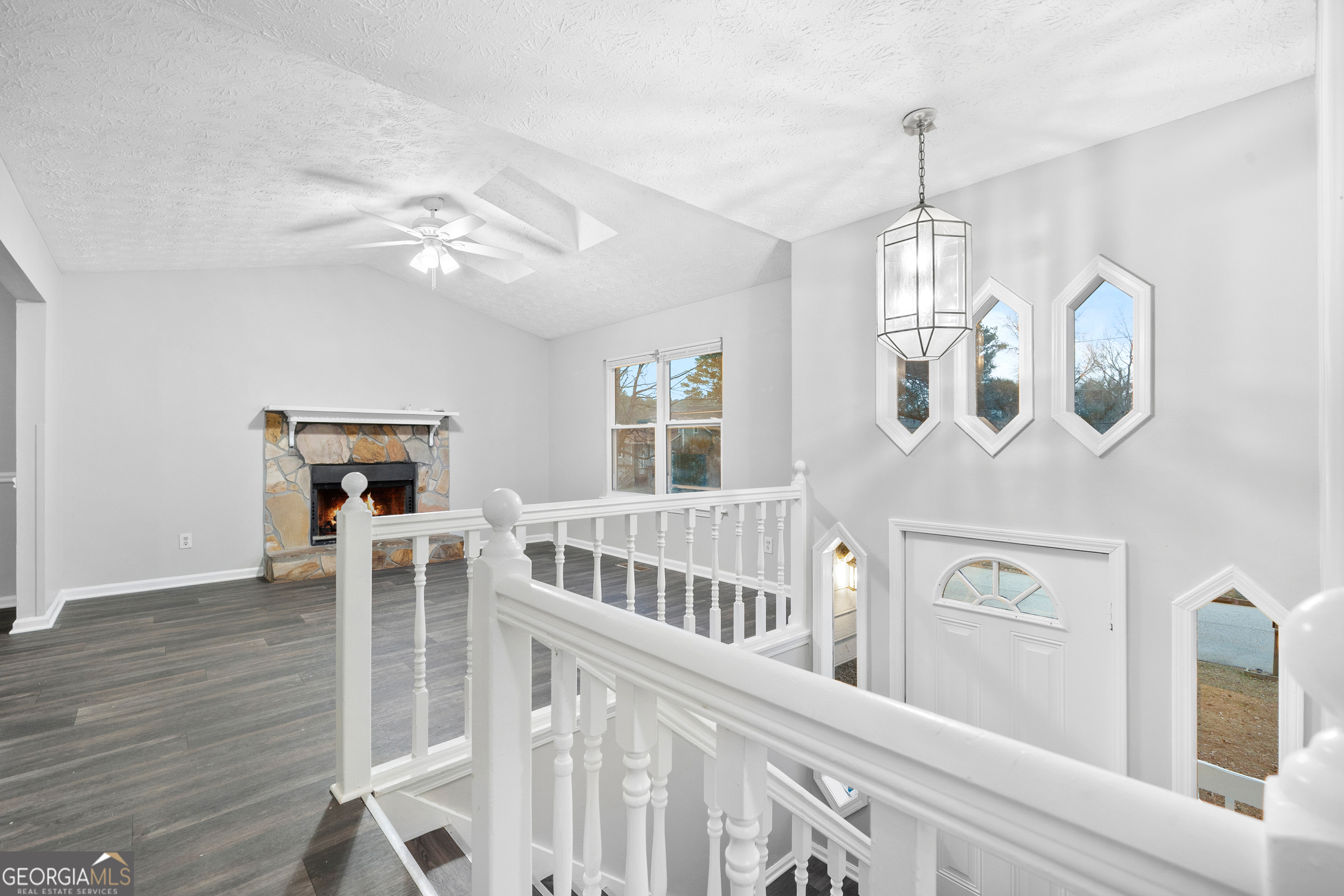 6155 Pointer Way Douglasville, GA 30135 - Photo 8 of 26 a view of a livingroom with furniture wooden floor windows
