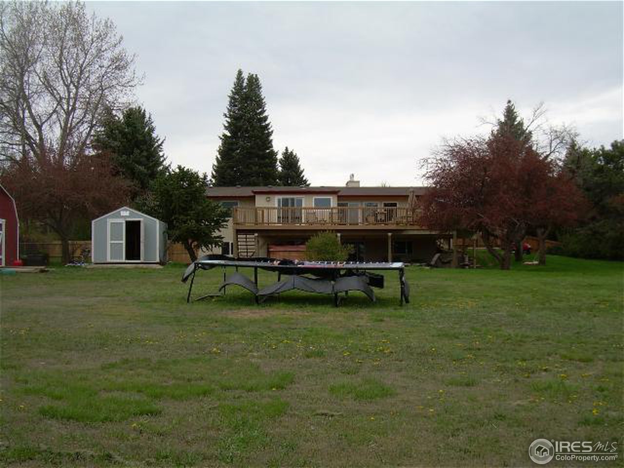 7701 O Connor Road Boulder, CO 80303 - Photo 15 of 18 a view of a house with a yard and sitting area