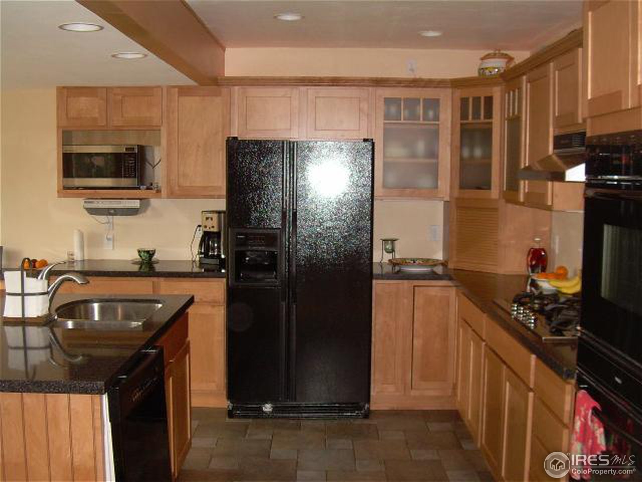 7701 O Connor Road Boulder, CO 80303 - Photo 4 of 18 a kitchen with stainless steel appliances granite countertop a refrigerator and a sink