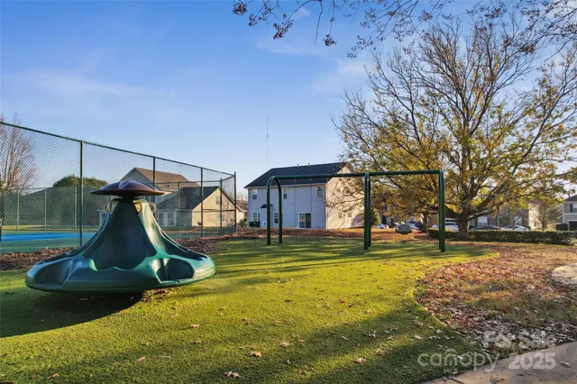 a view of a house with swimming pool
