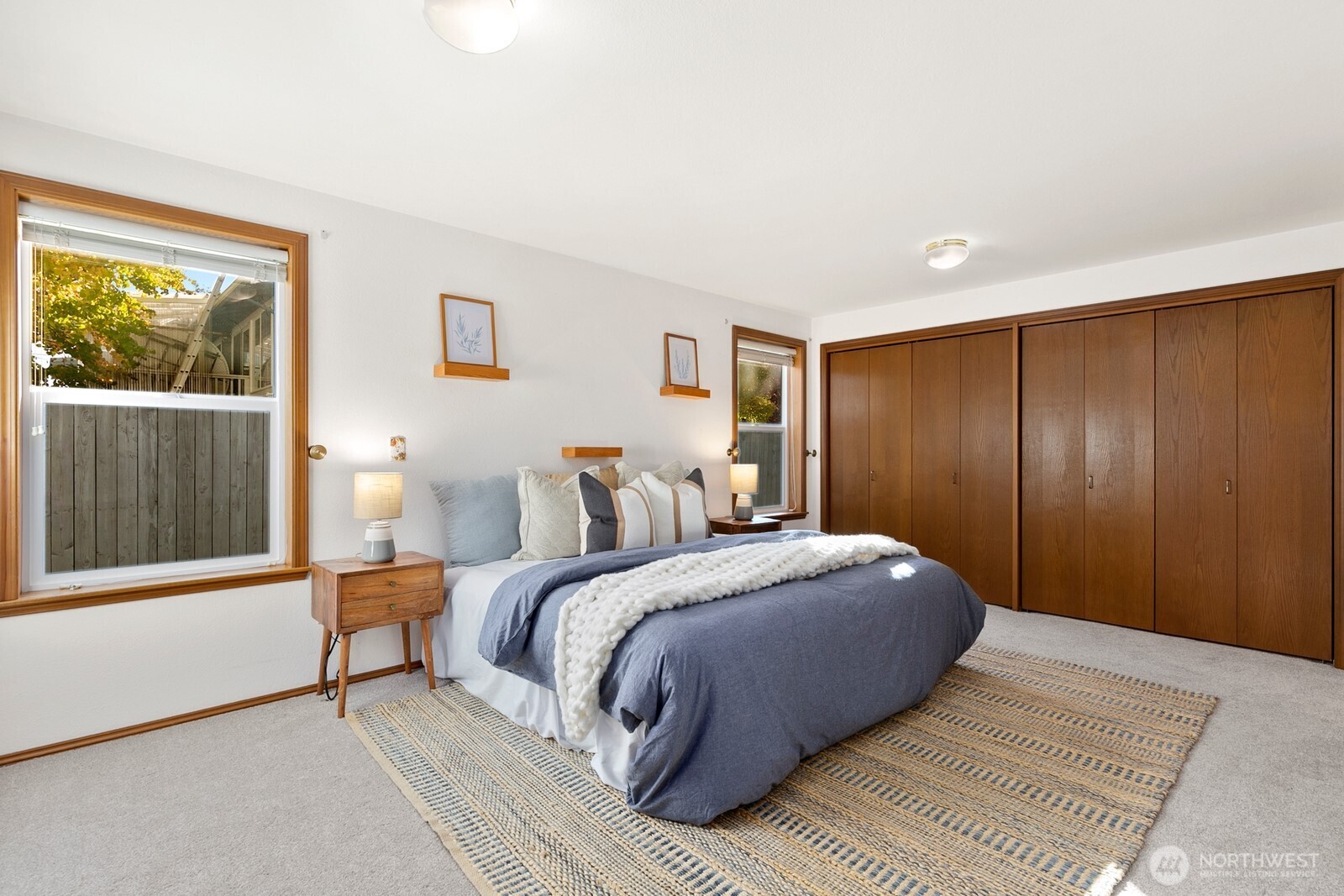 3908 Northeast 10th Street Renton, WA 98056 - Photo 14 of 29 a bedroom with a large bed and a window