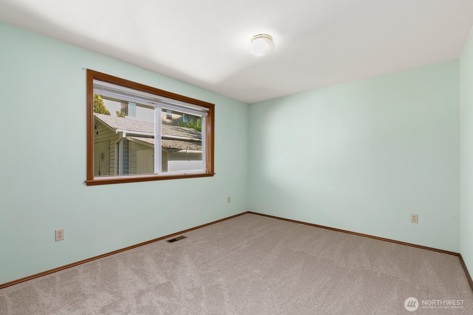 3908 Northeast 10th Street Renton, WA 98056 - Photo 17 of 29 a view of an empty room with a window