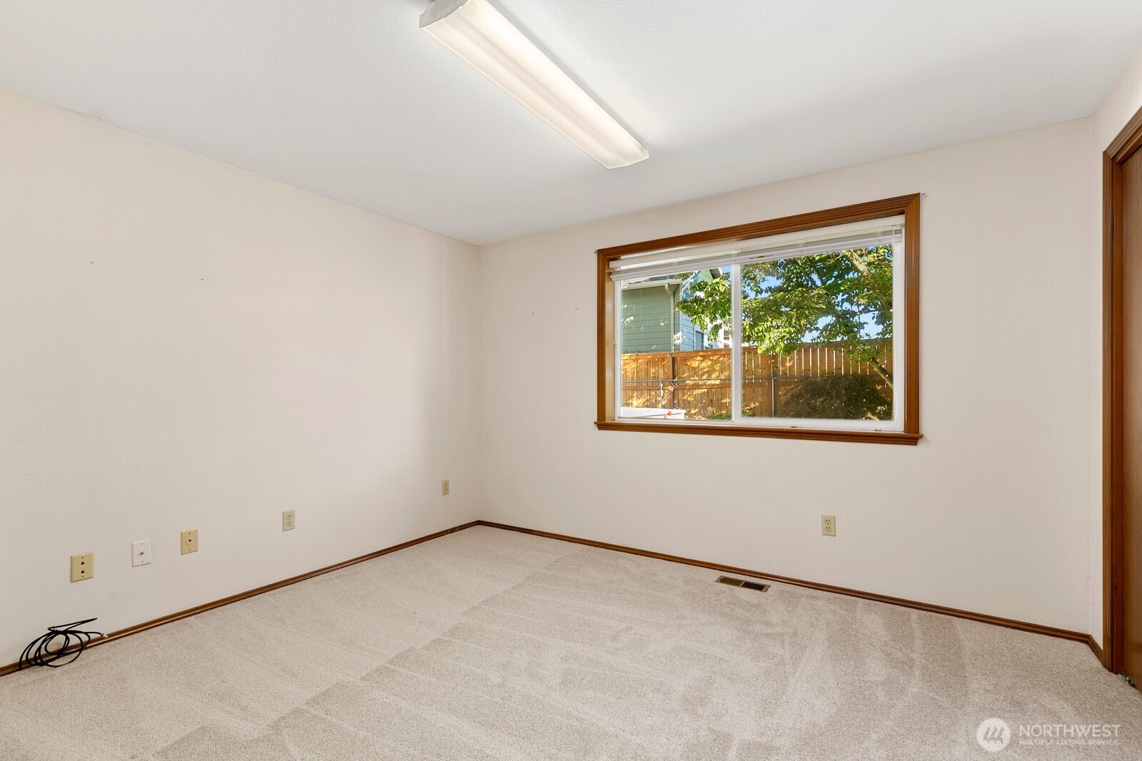3908 Northeast 10th Street Renton, WA 98056 - Photo 18 of 29 an empty room with a window