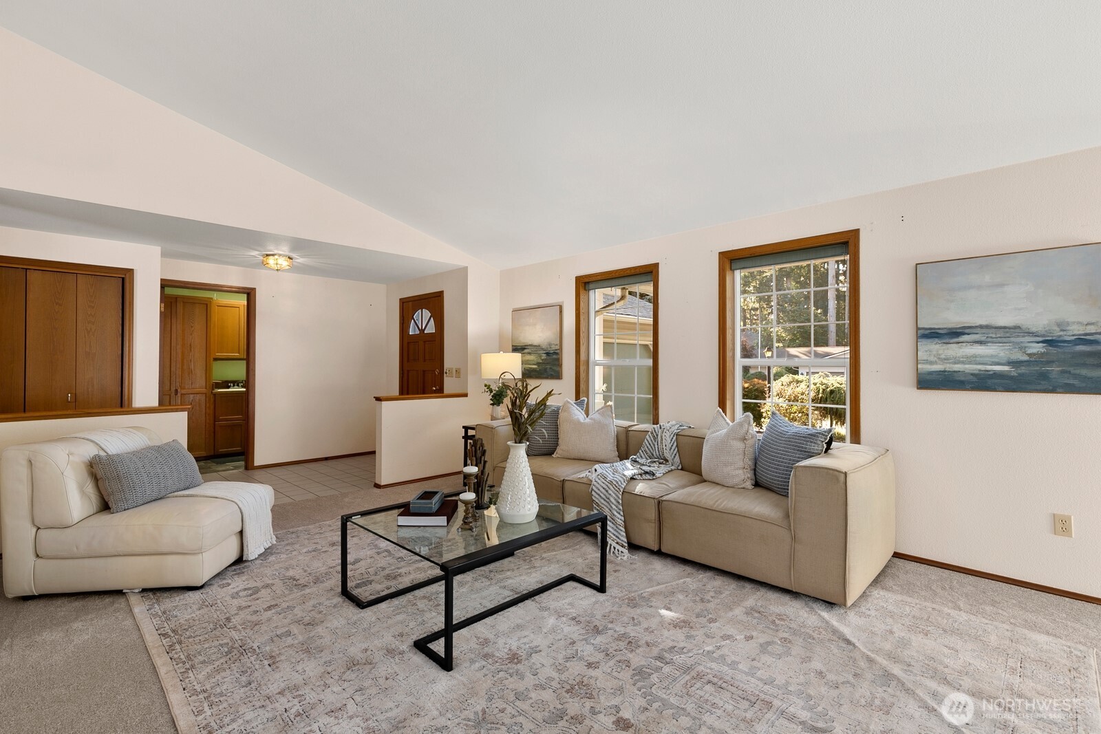 3908 Northeast 10th Street Renton, WA 98056 - Photo 2 of 29 a living room with furniture and a large window