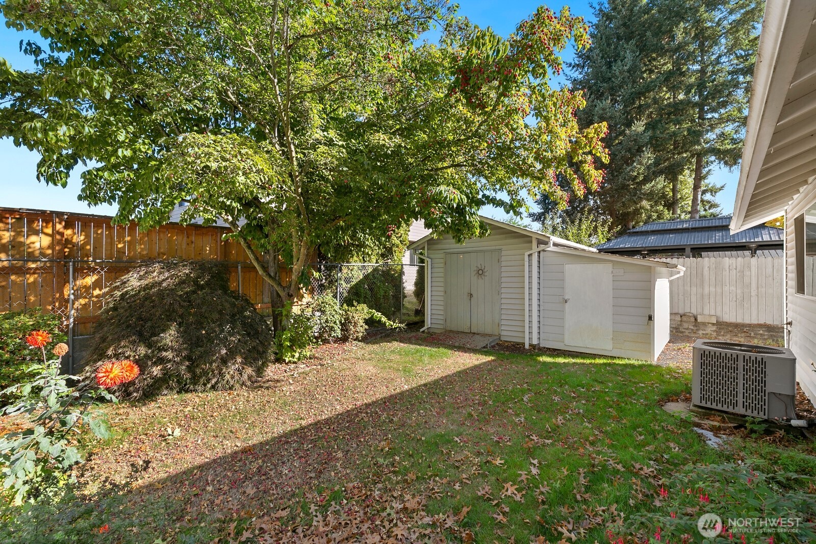 3908 Northeast 10th Street Renton, WA 98056 - Photo 26 of 29 a backyard of a house with yard and garage