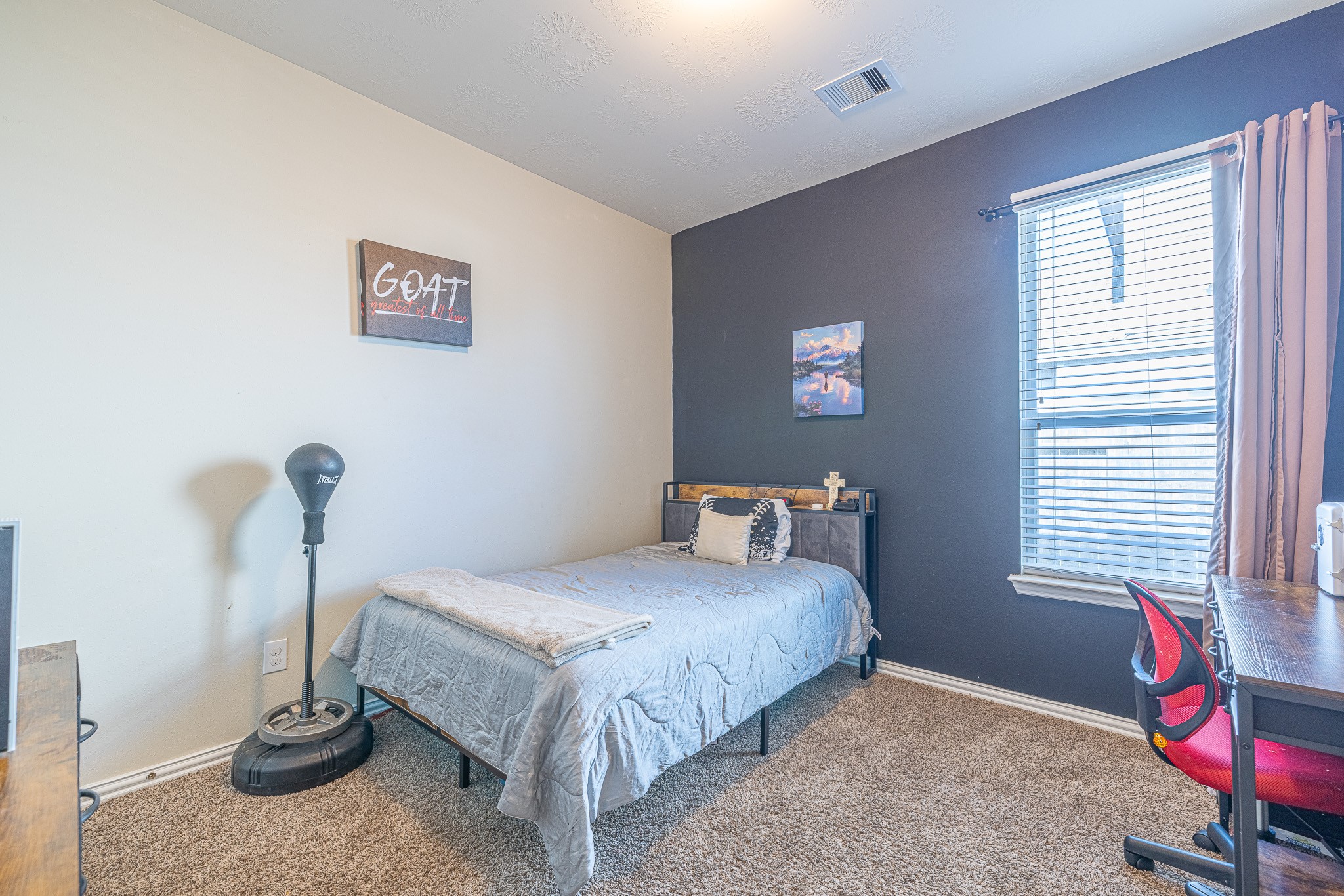 3818 Hunters Trail Baytown, TX 77521 - Photo 25 of 32 a bedroom with a bed and a window