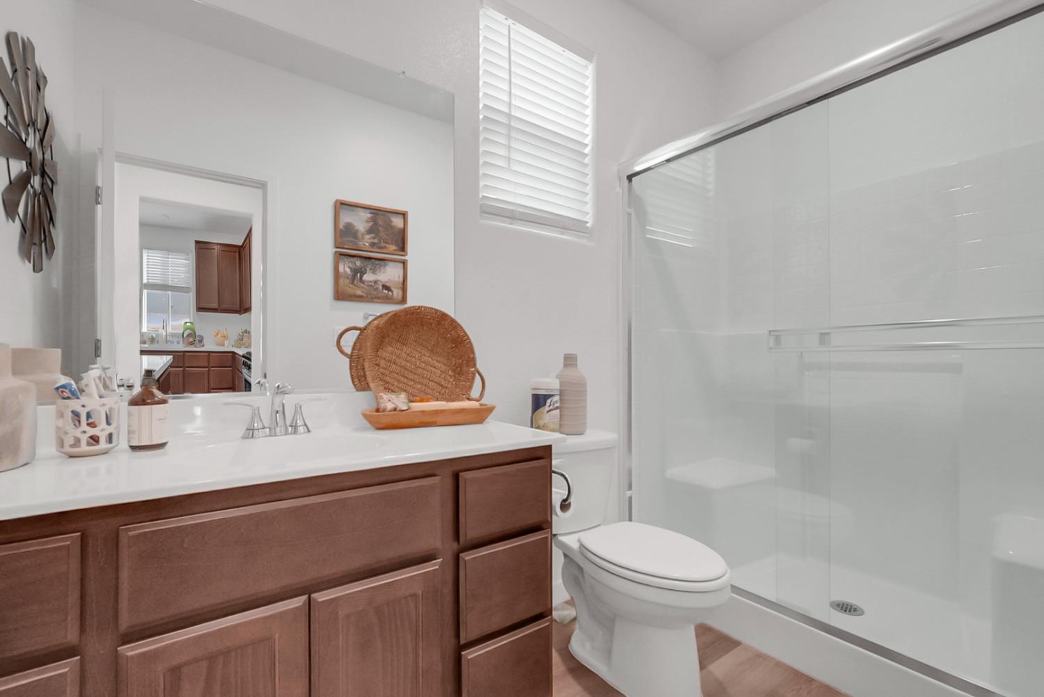 5518 Julia Avenue Keyes, CA 95328 - Photo 11 of 22 a bathroom with a sink toilet and shower