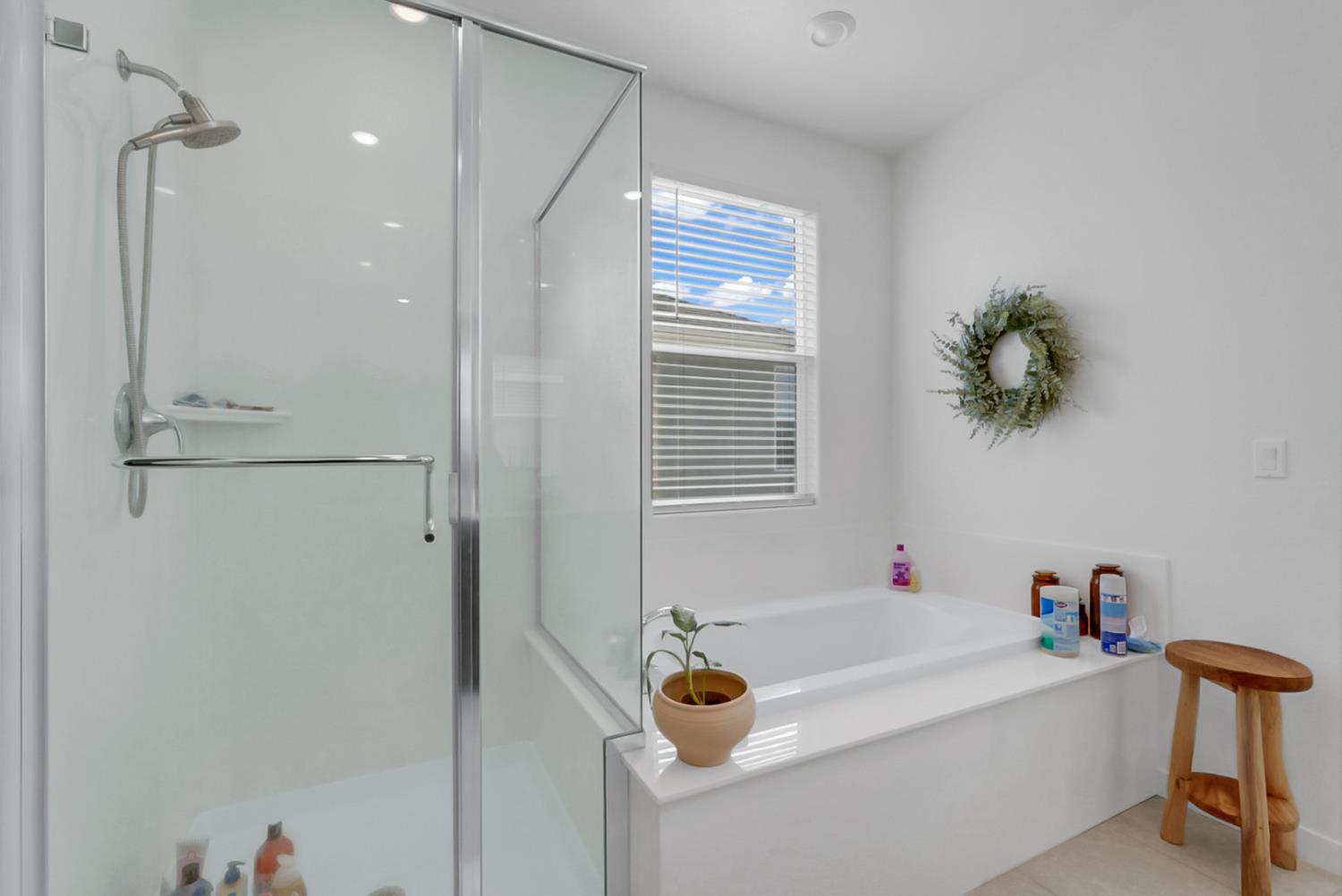 5518 Julia Avenue Keyes, CA 95328 - Photo 13 of 22 a bathroom with a tub and shower