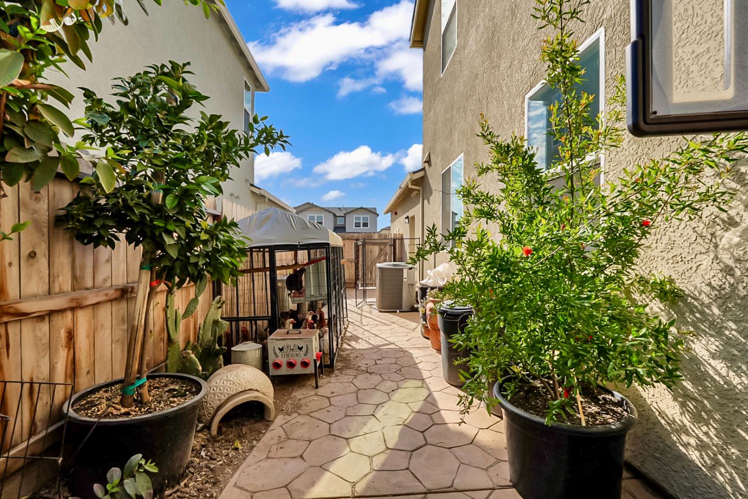 5518 Julia Avenue Keyes, CA 95328 - Photo 18 of 22 a view of a backyard with sitting area