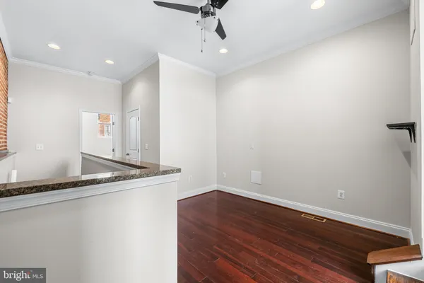 a view of a terrace with couches and pool