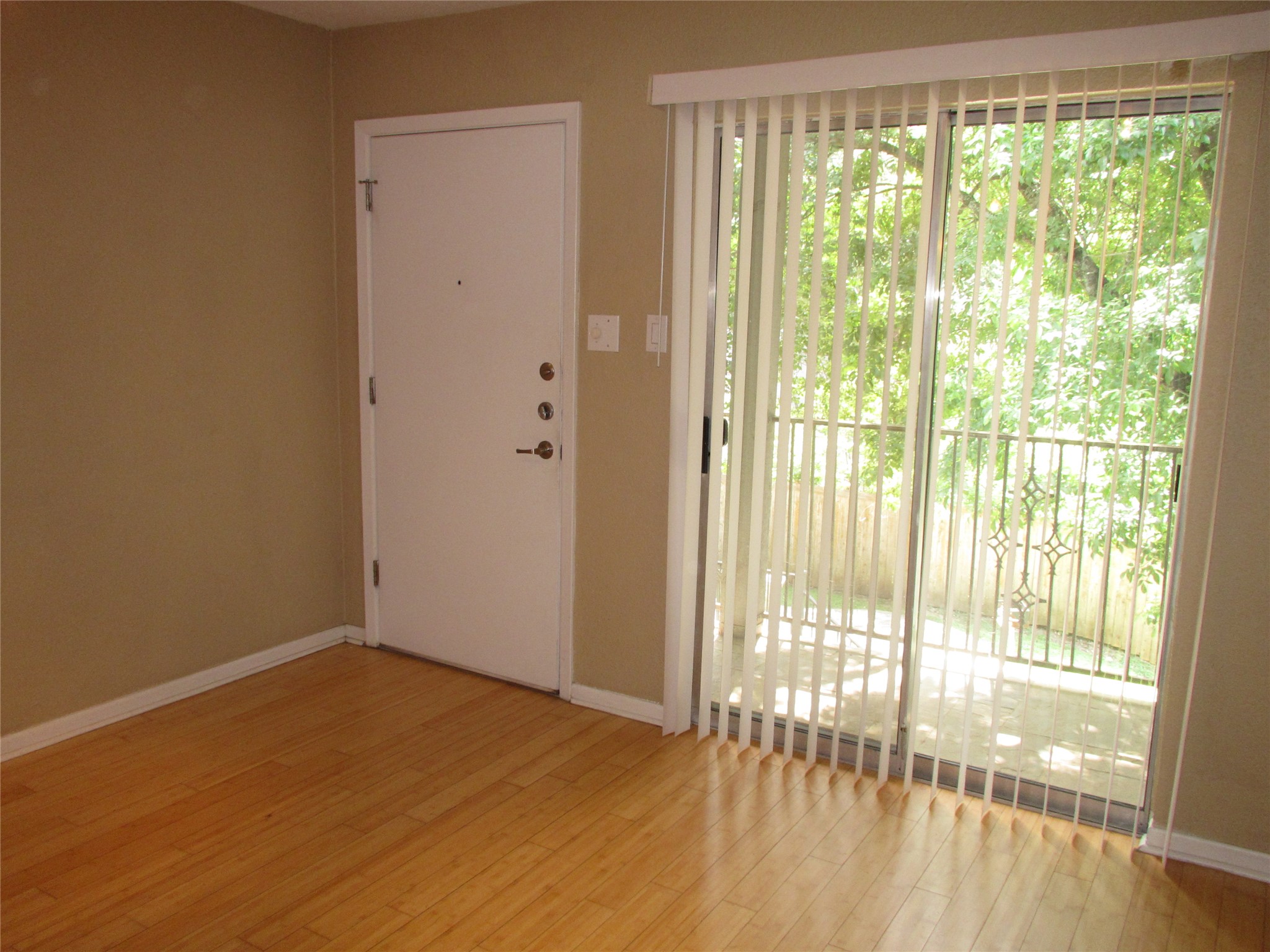 3204 Menchaca Road, Unit 702 Austin, TX 78704 - Photo 3 of 14 Spare room featuring light wood-style flooring and baseboards