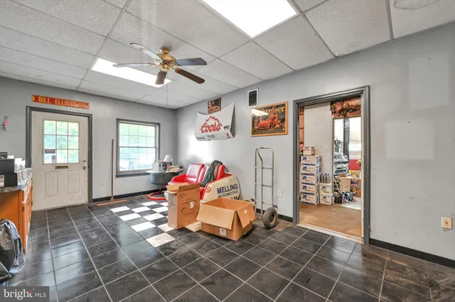 a water heater room with a couch