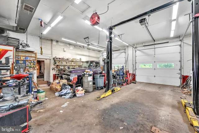 a view of a grassy field with trees