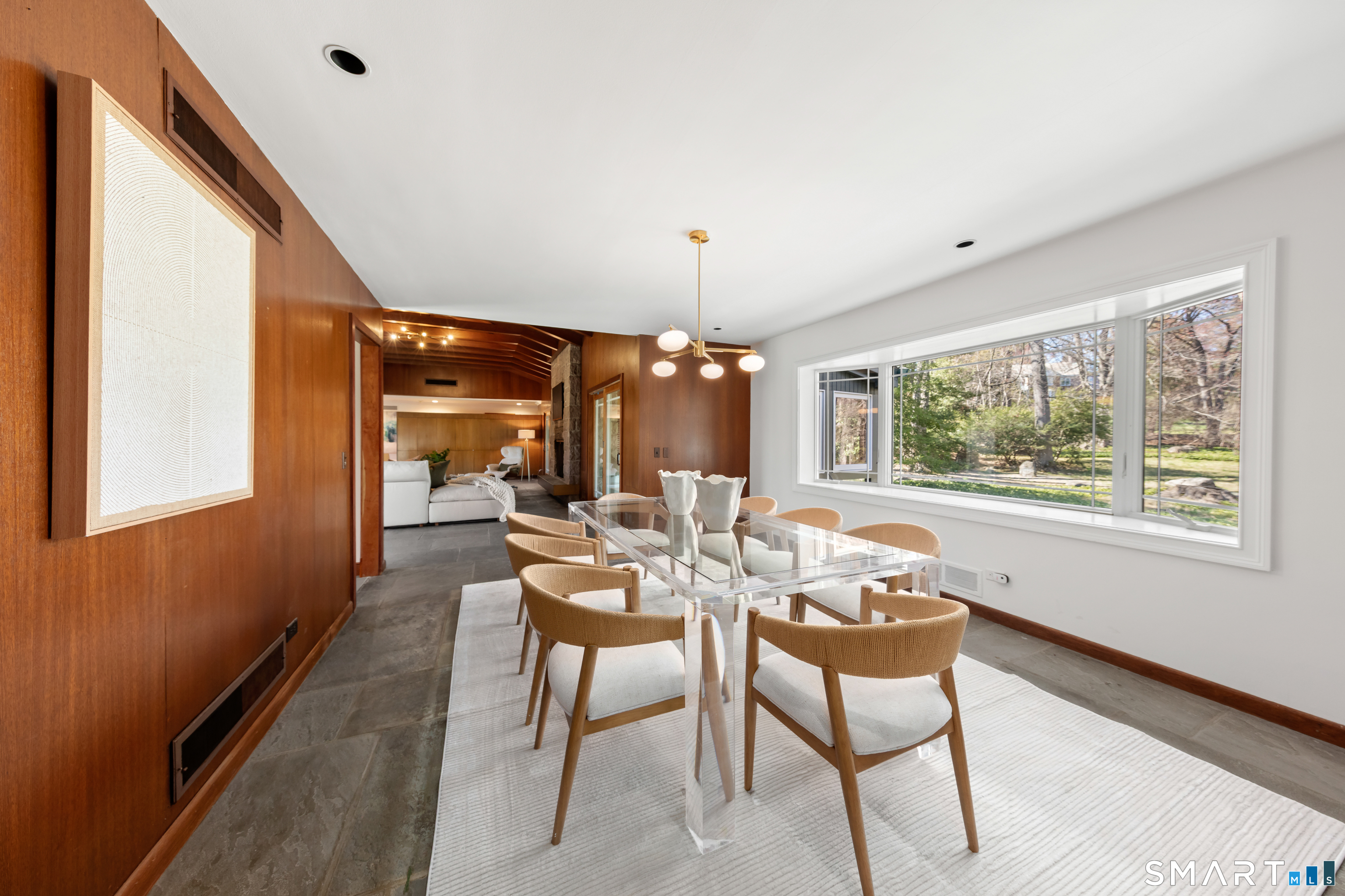 143 Palmer Hill Road Stamford, CT 06902 - Photo 11 of 40 a dining room with furniture and window