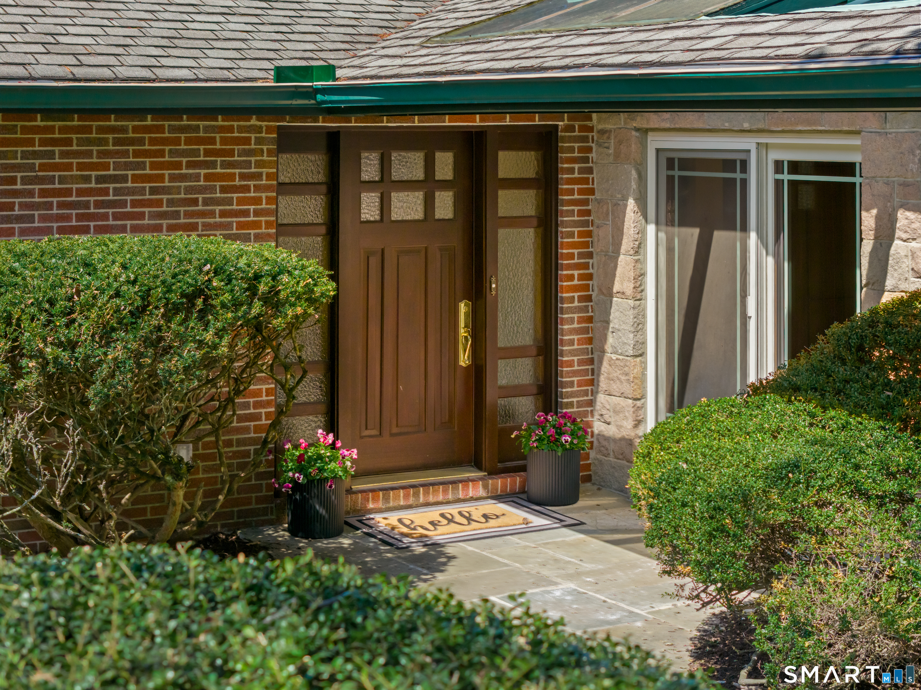 143 Palmer Hill Road Stamford, CT 06902 - Photo 2 of 40 a couple of potted plants in front of door