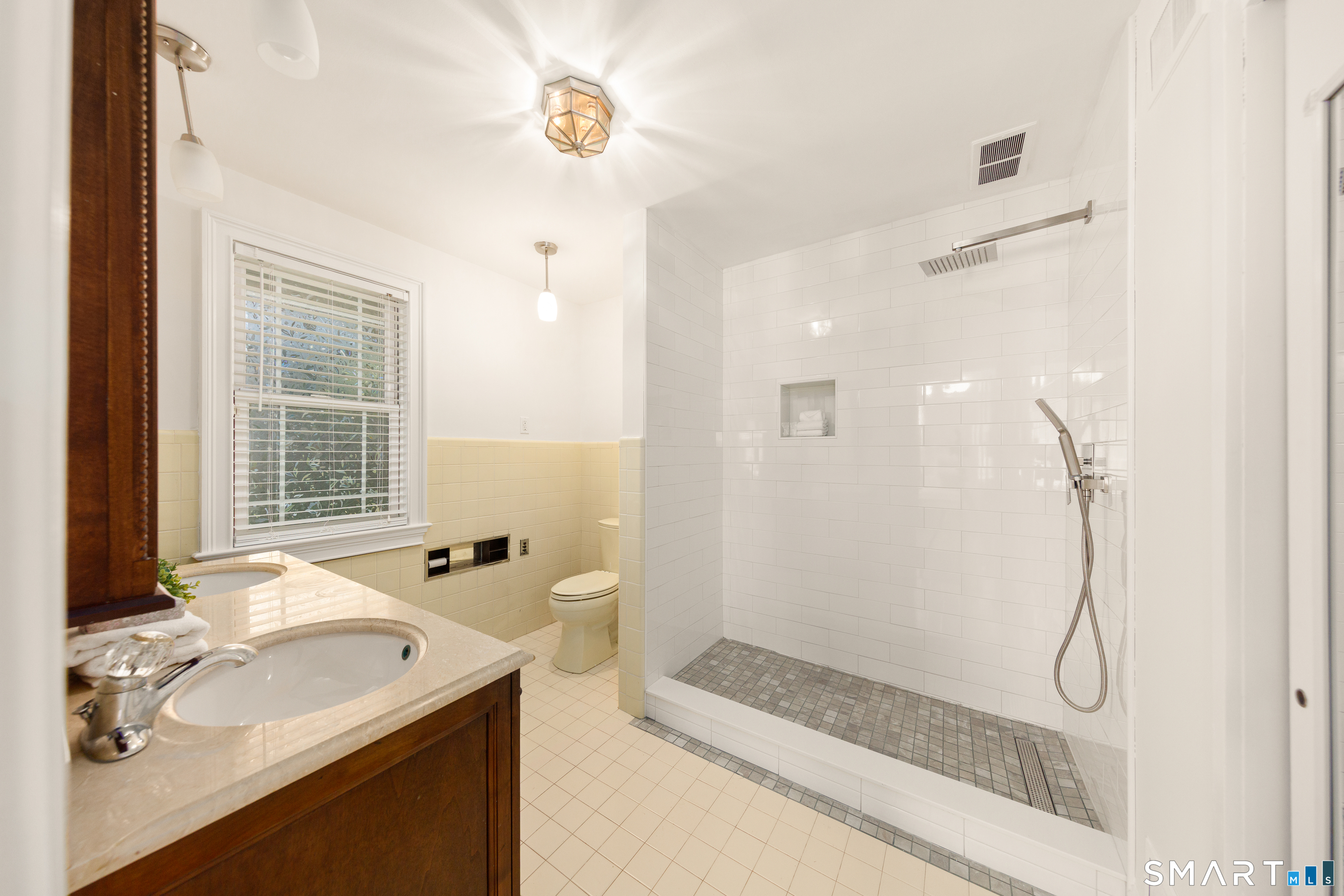 143 Palmer Hill Road Stamford, CT 06902 - Photo 21 of 40 a bathroom with a sink and a shower