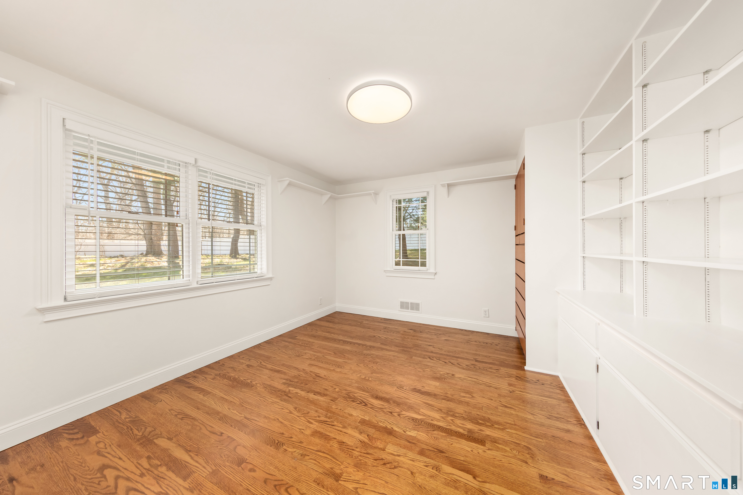 143 Palmer Hill Road Stamford, CT 06902 - Photo 24 of 40 a view of an empty room with a window