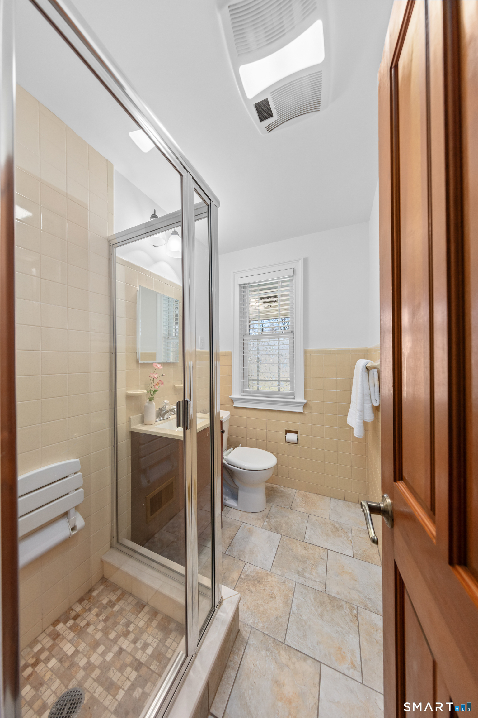 143 Palmer Hill Road Stamford, CT 06902 - Photo 29 of 40 a bathroom with a toilet shower and a sink