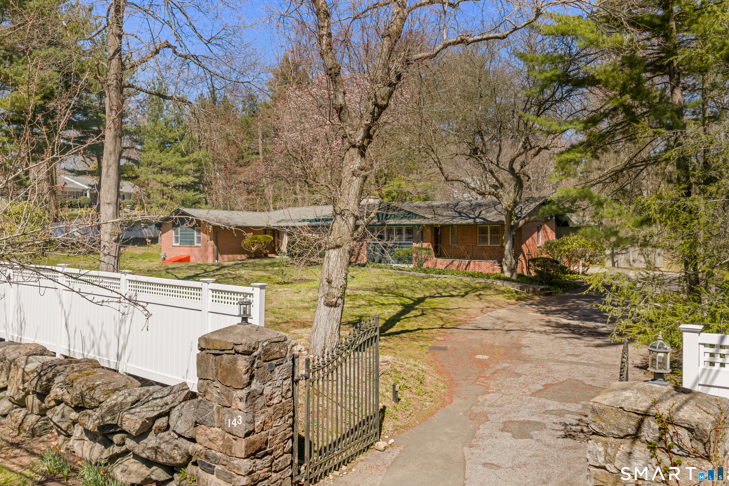 143 Palmer Hill Road Stamford, CT 06902 - Photo 34 of 40 a house view with a backyard space