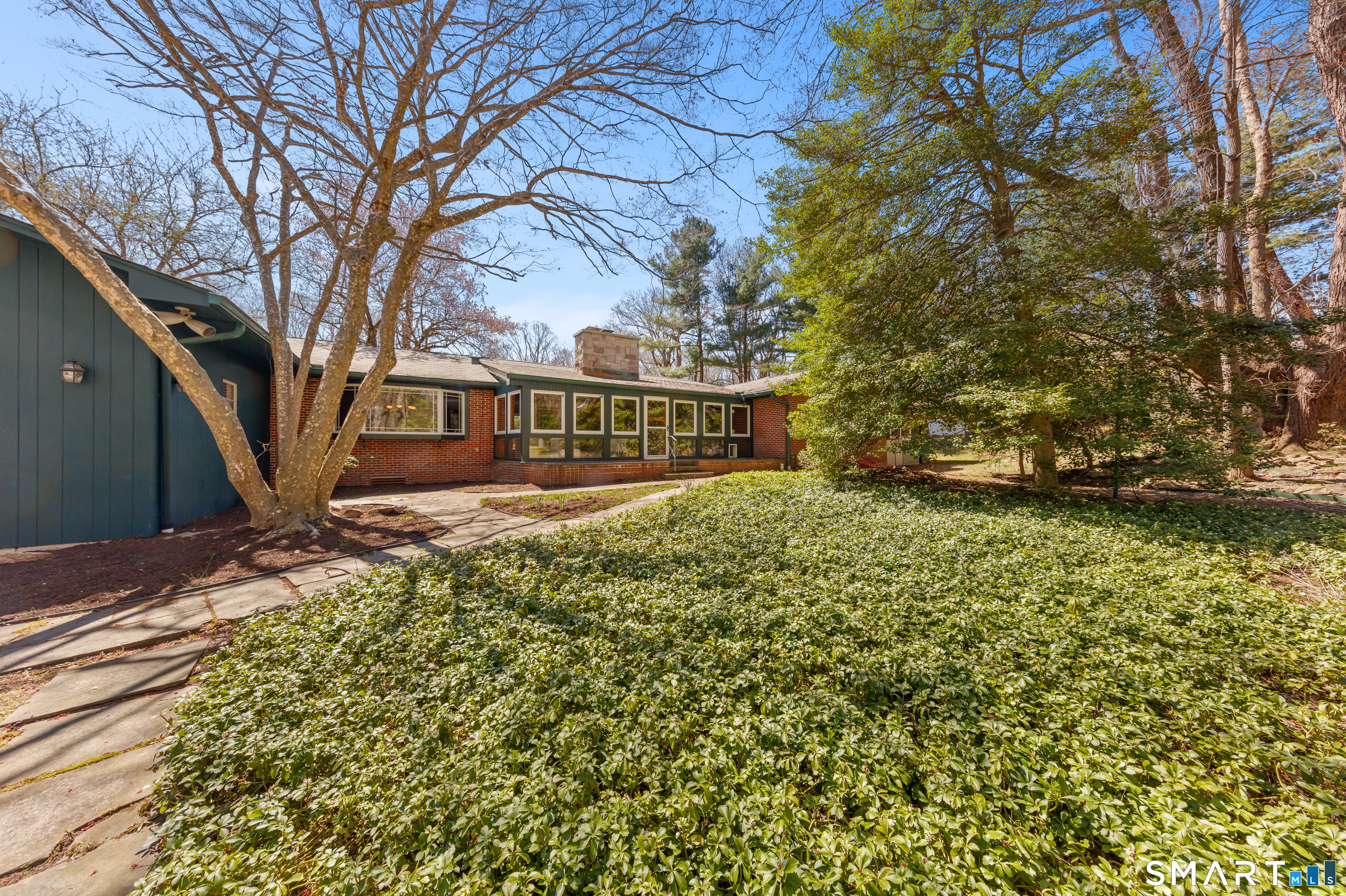 143 Palmer Hill Road Stamford, CT 06902 - Photo 37 of 40 a front view of a house with a yard